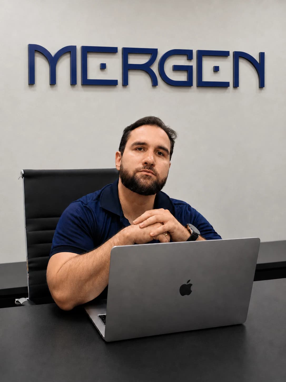 Mergen team member in the company's workspace